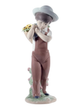 Lladró Gathering Flowers Boy Figurine. 60th Anniversary (SKU: 01008675)